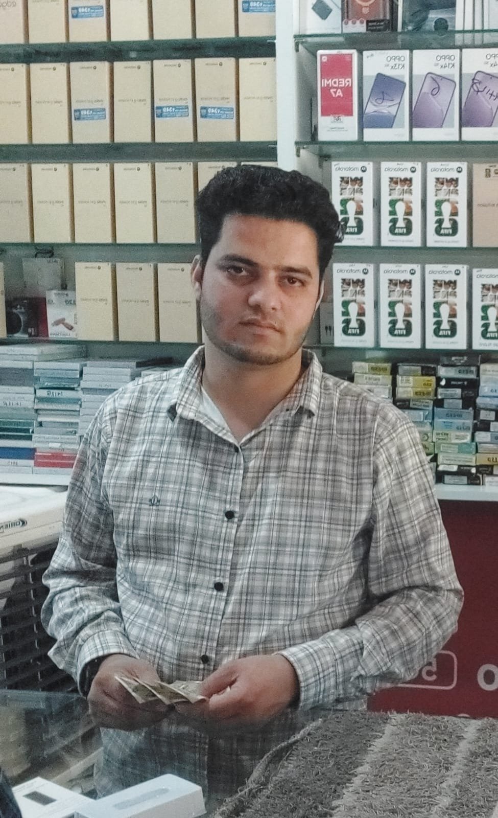 Mr. Rashid Khan